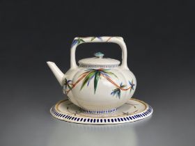 A 19th century Wedgwood 'Bamboo' teapot & stand. Impressed marks & registration lozenge to base.