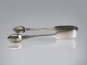 A PAIR OF GEORGE III STERLING SILVER SUGAR TONGS. London, 1792 hallmarks. Length - 15cm Approx 42g