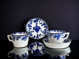 TWO VICTORIAN MINTONS TEACUPS & SAUCERS. Blue & white 'Delft' pattern.