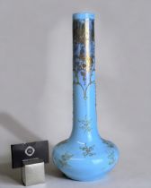 A TALL 19TH CENTURY TURQUOISE OPALINE GLASS VASE. Over-painted stylised foliate design. Bulbous base