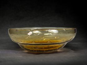 A Whitefriars Amber 'Controlled bubble' glass bowl. 7.5 x 22cm