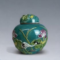 A CHINESE ENAMEL PAINTED RELIEF DECORATED GINGER JAR. Late Qing dynasty. "Wang Bingrong" style,