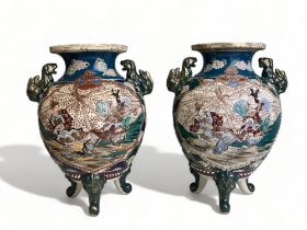A pair of large Japanese Satsuma Koro vases. Moriage decorated with Lion handles. Height - 35 cm