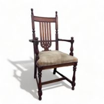 A VICTORIAN AESTHETIC MOVEMENT STYLE CHAIR. UPHOLSTERED SEAT, WITH STYLISED DESIGN BACKREST AND