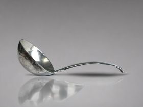 A GEORGIAN SILVER CREAM LADLE. London, 1823 hallmarks. Possibly Robert Pinkney. Length - 11cm Approx