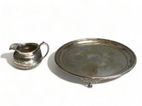 A VICTORIAN SILVER PLATE TRAY AND MILK JUG. DECORATED WITH CHRISTOPHER DRESSER TYPE 'JAPONESQUE'