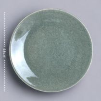 A LARGE CHINESE CELADON CRACKLE GROUND CHARGER. Diameter - 46cm