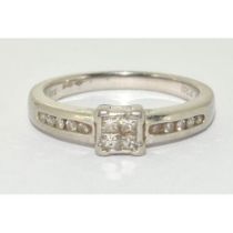 Platinum Ladies Diamond ring set with Diamond shoulders and H/M in ring as 0.25ct size L