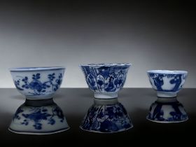 THREE QING DYNASTY CHINESE PORCELAIN WINE CUPS & TEABOWL. Including a Kangxi period moulded wine