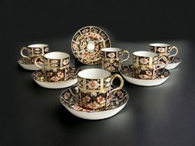 A Set of six Royal Crown Derby Imari pattern coffee cans and saucers, pattern 2451. Each piece