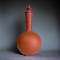 A WATCOMBE OR TORQUAY TERRACOTTA FLASK VASE. Attributed to Christopher Dresser. Circa 1890. Height -