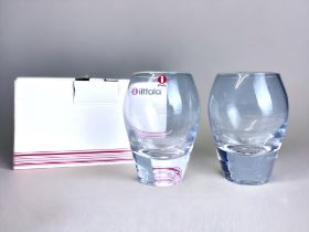 A BOXED PAIR OF IITTALA DRINKING GLASSES.