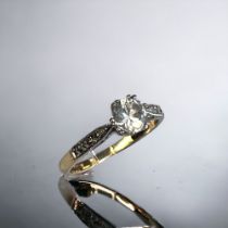 A ladies 9ct white & yellow gold solitaire ring. Set with central round cut cubic zirconia. Chester,
