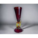 A tall Venetian Murano glass Goblet. In 'Salviati' style, with an Elephant form stem and ruby bowl.