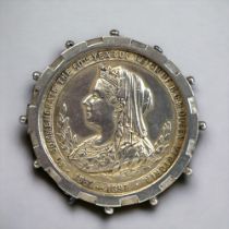 A Silver Mounted Queen Victoria Diamond Jubilee Medal. 'To commemorate the 60th year of reign of H.