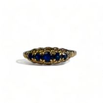 Antique Ladies 9CT Gold Ring. Set with five graduating blue gemstones. UK size - L 1/2