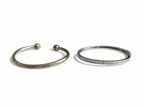 A Sterling Silver & Cubic Zirconia Hinged Bracelet, Together with silver (unmarked-tested) Bangle.