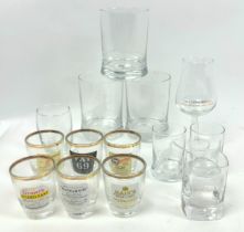 A collection of various 'Whisky' related glasses.