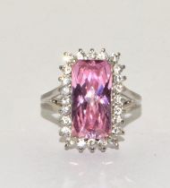 925 silver Oblong Pink Tourmaline coloured stone ring in a halo design. Size O