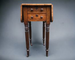 A Victorian Pembroke work Table. Rosewood veneered with satinwood inlay. With 2x fitted interior