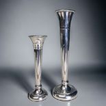 A pair of sterling silver stem vases. A.T Canon Ltd. Birmingham, 1979 hallmarks. Tallest - 16.5cm