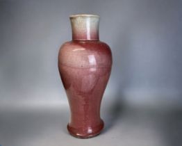 A Chinese Langyao 'Peachbloom' glaze baluster vase. Qing dynasty, Kangxi period. Slender baluster