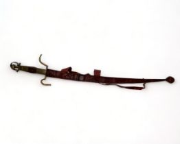 A Taureg / Berber carved sword & Scabbard. North Africa, 20th century. Length - 110cm