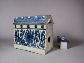 A SCARCE CHINESE PORCELAIN BUILDING BLOCK RIDGE TILE. Qing dynasty. Blue & white painted foliate