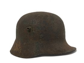 A WW1 German Ypres Battle Find Imperial Army Helmet. Still retaining original camouflage.