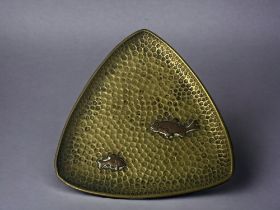 AN ARTS & CRAFTS DISH. Brass on copper, with relief fish. 10.5 x 10.5cm