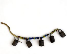 ANTIQUE TIBETAN / INDIAN BEADED COW BELLS. Strung with metal bells and multicoloured beads.