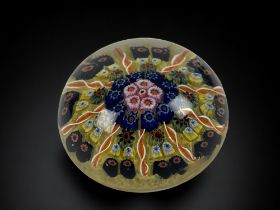 A large vintage Millefiori glass paperweight. 5.5 x 8cm