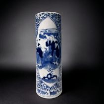 A CHINESE PORCELAIN TALL BRUSH POT. Qing dynasty. Tall, slender form. Painted four character