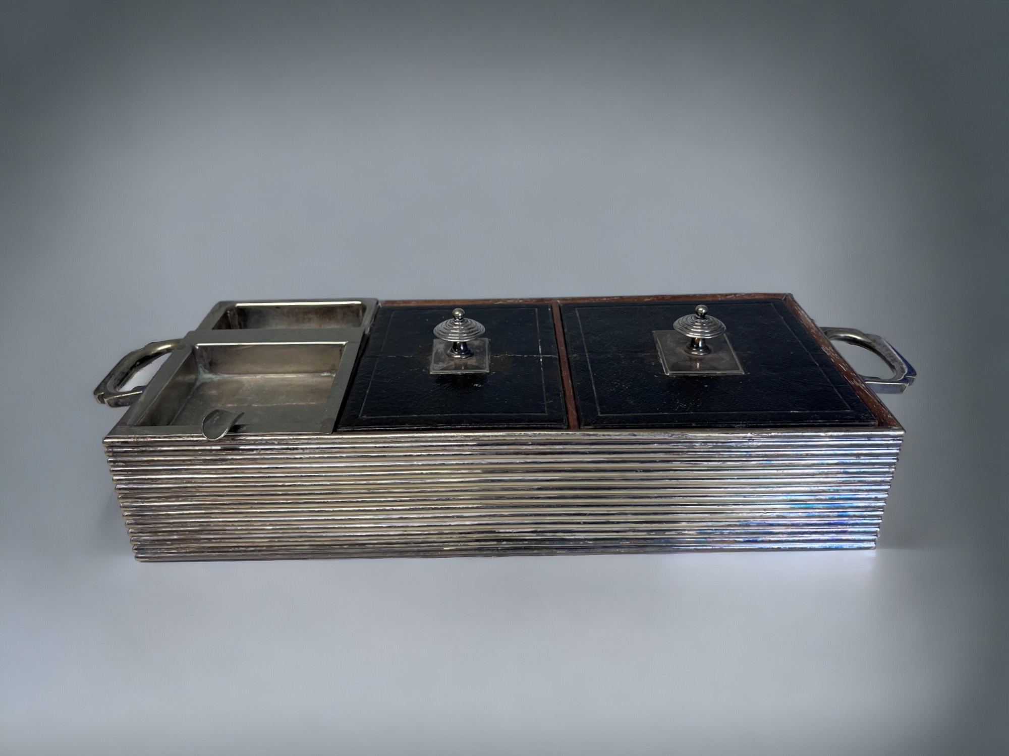 A VICTORIAN SILVER PLATE CIGAR BOX / COMPENDIUM. By Rhichard Hodd & son, Circa 1880. Ribbed silver