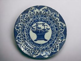 A large Chinese porcelain 'Flower basket' blue & white charger Qing dynasty, Kangxi period.