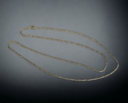 A long 18ct Gold rope twist chain. 80cm Long Weight - 11g