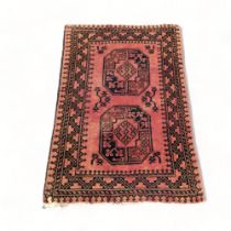 Antique Afghan Prayer rug. Red Ground with traditional black decoration. 47" x 32"
