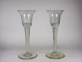 A pair of 19th century Air twist stem glasses. Height - 15.5cm
