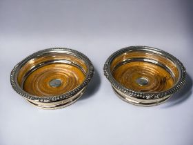 Two Victorian silver plate wine coasters. Diameter - 16cm