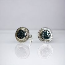 A pair of 3/4ct blue and white Diamond earrings. Set in 9Ct white gold. Ltd editions (new & unworn).