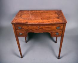 A 19th Century Sheraton Style Flame Mahogany Ladies writing desk. 1 over 2 drawers supported on