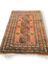 An Afghan gold ground rug, Size - 224 x 151cm