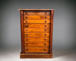 A Victorian Pine Wellington chest / collectors cabinet. With key and nine graduated drawers. Nice