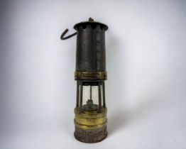 Antique brass miners lamp. Maker unknown.
