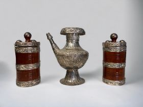 A NEPALESE BUDDHIST EWER (KARUWA). Together with two Gurkha ceremonial Ghee (Butter) boxes.