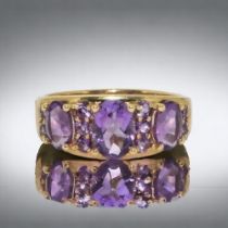 A 9ct gold ladies antique set Amethyst ring. Size M