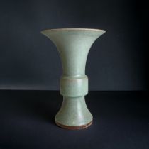A Chinese Longquan Celadon vase. Song dynasty. Gu shape. Property of an eminent Hong Kong collector.