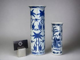 TWO CHINESE PORCELAIN SLEEVE VASES. Qing dynasty. The taller, underglaze painted with blossoming