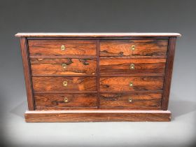 A Victorian Rosewood veneered Collectors Chest, Glass lift out lids in the drawers, campaign style