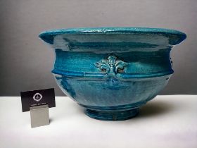 A LARGE ART NEAUVEAU PLANTER. Circa 1900. Stoneware, with a turquoise Majolica glaze and fleur-de-